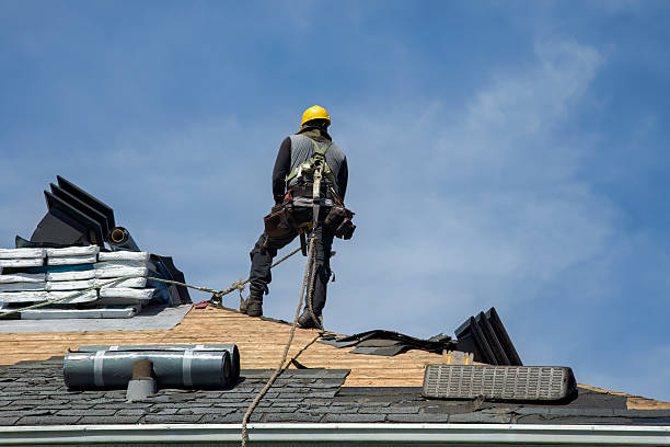 Professional Roof Replacement technician working in Troy, MI